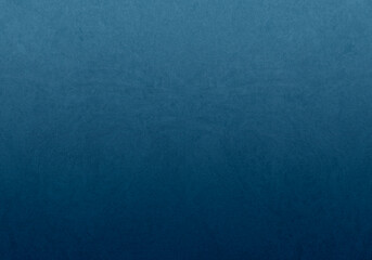 Fondo de textura de papel en color azul con degradado sutil de luz © Gabrieuskal