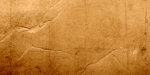 Fototapeta premium Vintage brown old paper texture on a grunge aged wood background with a stained parchment pattern and worn antique surface design