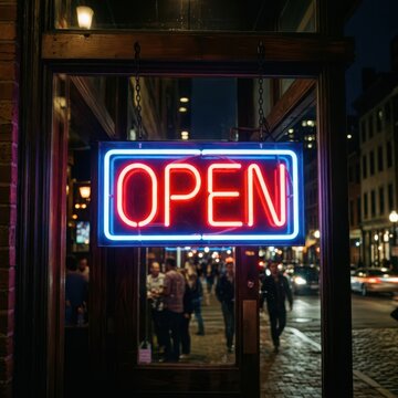 Vibrant neon open sign illuminating a bustling street at night
