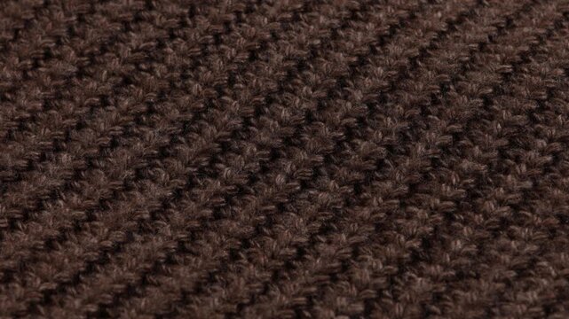 textile woolen or cotton brown background element of winter clothing