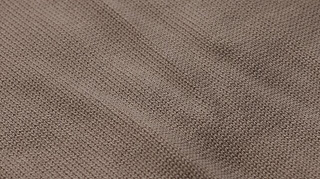 beige knitted textile cotton background element of garment