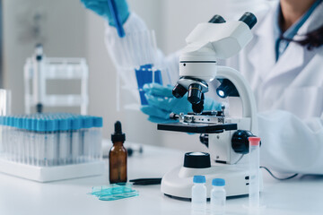 Fototapeta premium Scientist analyze biochemicals in a laboratory for health care research progress