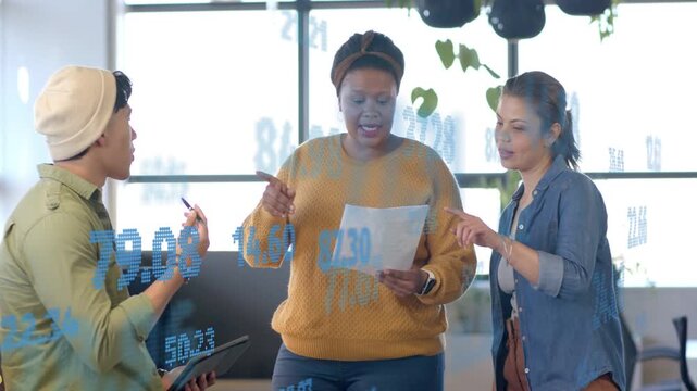 Team reviewing biz doc center reading gesturing causing blue overlay left tablet right pointing