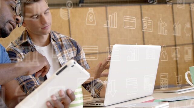 Blue man tapping tablet, plaid man typing, comparing finance chart with overlay icons highlighting