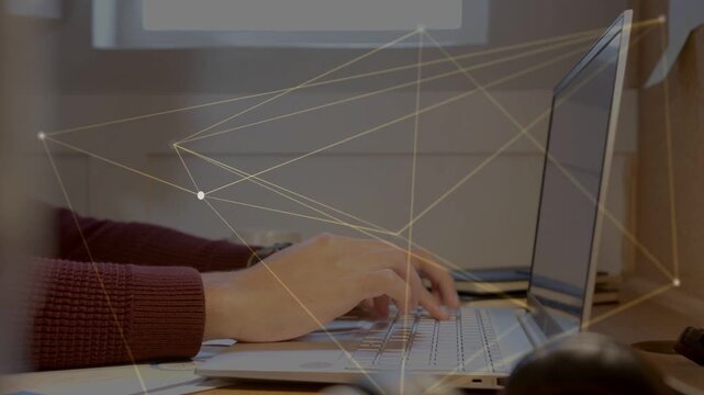 Man starting typing from rest, animated network drifting over hands and laptop, aiding tech work