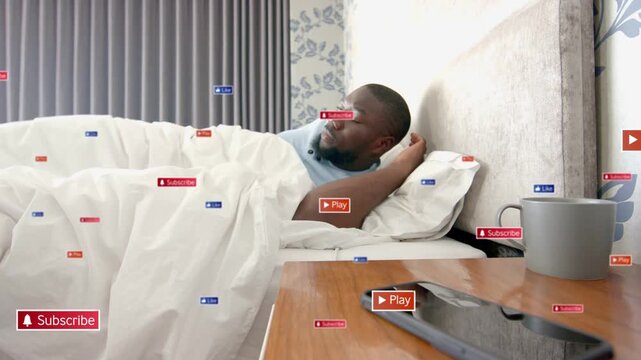 Man waking and tapping phone checking alerts pulling duvet sitting up seeing social media icons