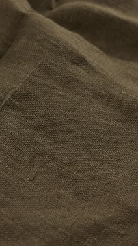 dark green natural textile background cotton or linnen vertical video