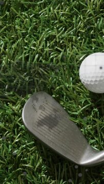 Vertical video: Focus pull moving club head into view, showing grooves and turf, ball staying still