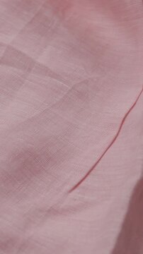 light pink natural summer textile background cotton or linnen vertical video 