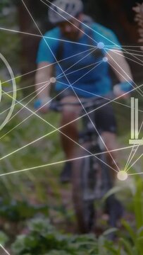 Vertical video: Two cyclists riding trail data HUD appearing over riders then fading tracking speed