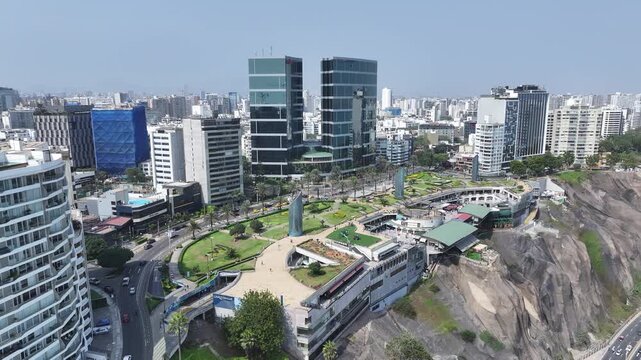 Larcomar Shopping In Miraflores In Lima Peru. Highrise Buildings. Green Coast Seascape. Travel Destination. Larcomar Shopping In Miraflores In Lima Peru. Leisure Park Landscape. Green Coast.