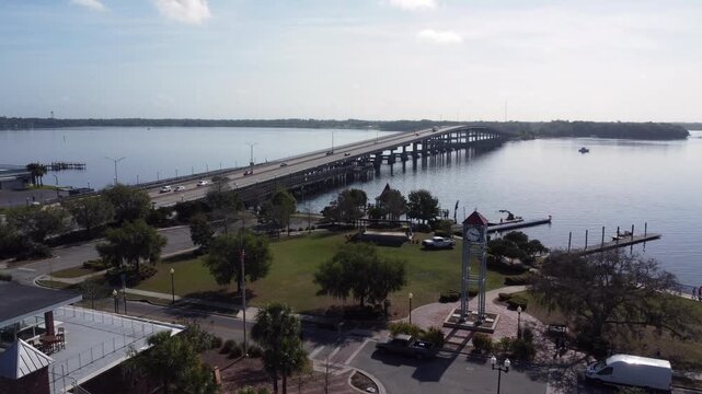Downtown Palatka looking at the clock tower and bridge drone shot two