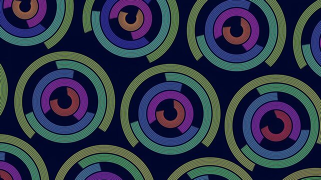 Colorful concentric circular rings rotate and pulse on a dark blue background, creating a futuristic HUD interface and data visualization motion design for technology themes
