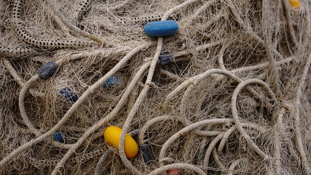 ropes, buoys and fishing net as background