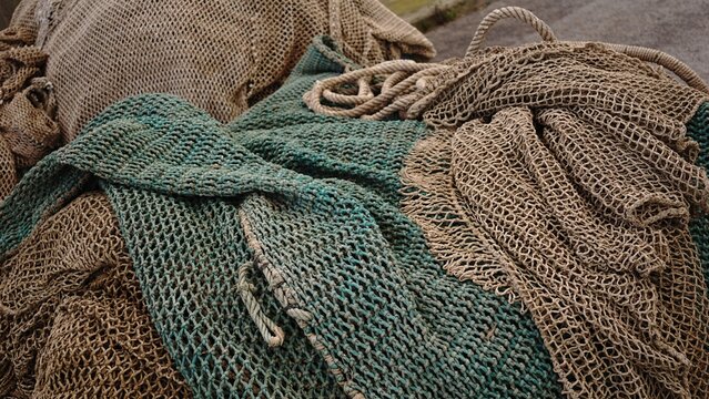 stacked industrial fishing nets