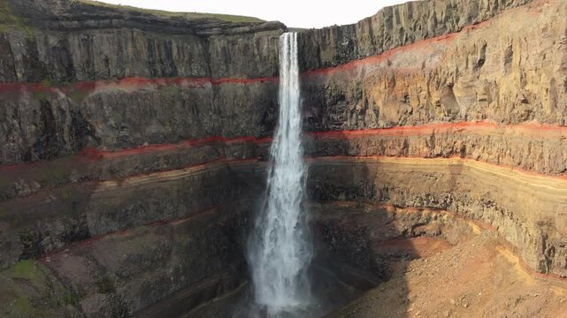 Famous red Hengifoss waterfall Iceland aerial drone