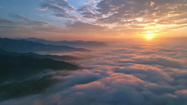 Sunrise Over Mountain Clouds