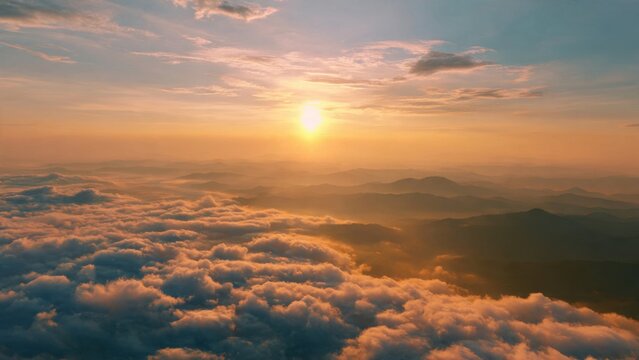 Sunrise Over Mountain Clouds