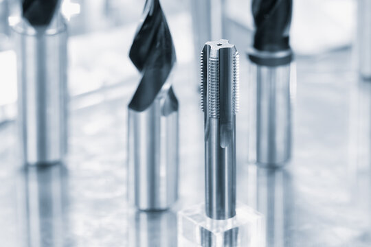 industrial drilling milling metal cutting tool with carbide cutter insert in workshop. Drills with interchangeable tungsten carbide heads. Milling metal cutter tools CNC machine, industrial background