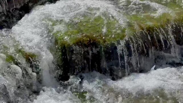 Crystal Clear Water Flowing Over Stone Steps in Wadi Hanifa
