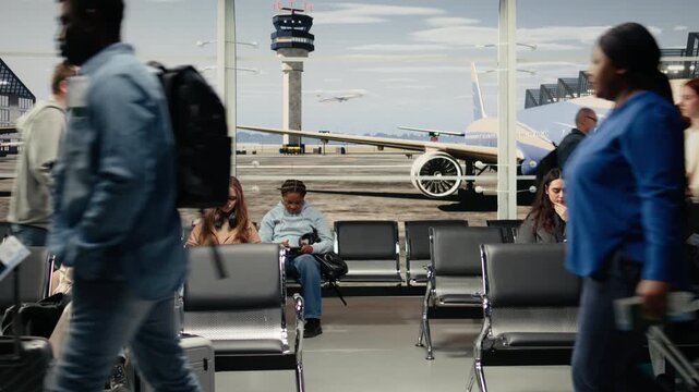 Bumping trolleys, crowded and man with woman navigating airport hallway. Rushing, clashing luggage and travelers trying to to catch plane in busy transportation hub, camera A