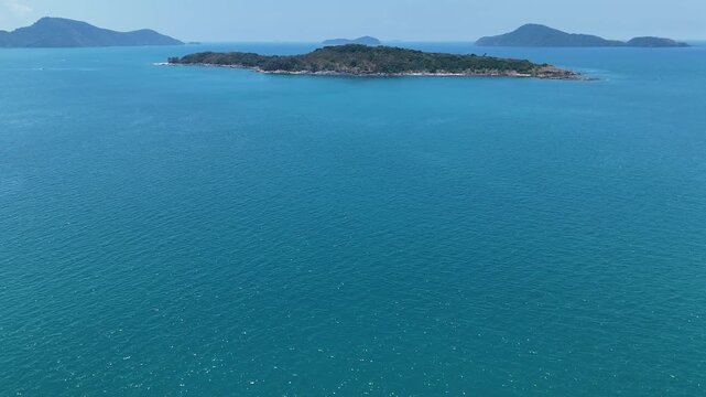 Serene Island Escape Tranquil Nature Surrounded by Clear Blue Sea and Bright Sky, Evoking Sense of Peace and Calm