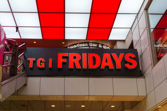 Tokyo, Japan - April 14, 2026: Sign for a TGI Fridays restaurant in Shibuya Tokyo Japan. This is an American chain