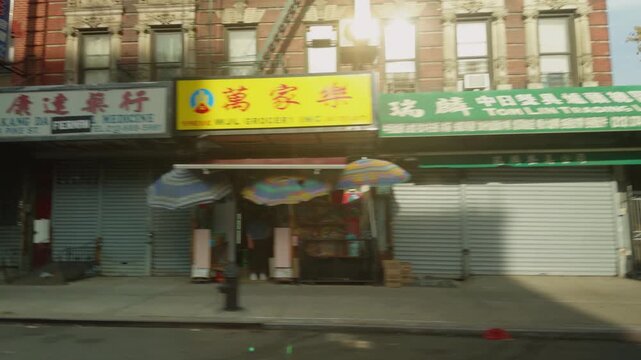 Driving Past Chinatown Street with Traditional Buildings and Shops