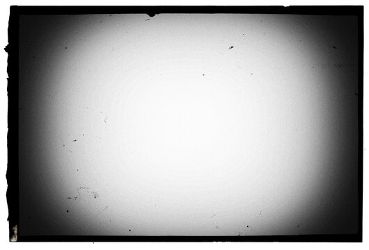 Vintage slide film frame of an old camera with pingole vignette, film grain, dusts and scratches on transparent background (png image).
