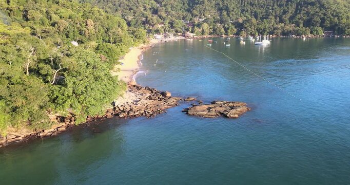 Aerial landscape of Picinguaba bay surrounded by tropical rainforest, Ubatuba coast. Paisagem a&eacute;rea da ba&iacute;a de Picinguaba cercada por floresta tropical, costa de Ubatuba