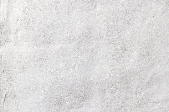 background of white painted textured plaster wall