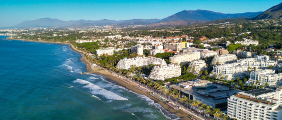 Fototapeta premium Marbella, Andalusia. Beauiful aerial view of cityscape along the coast at dawn