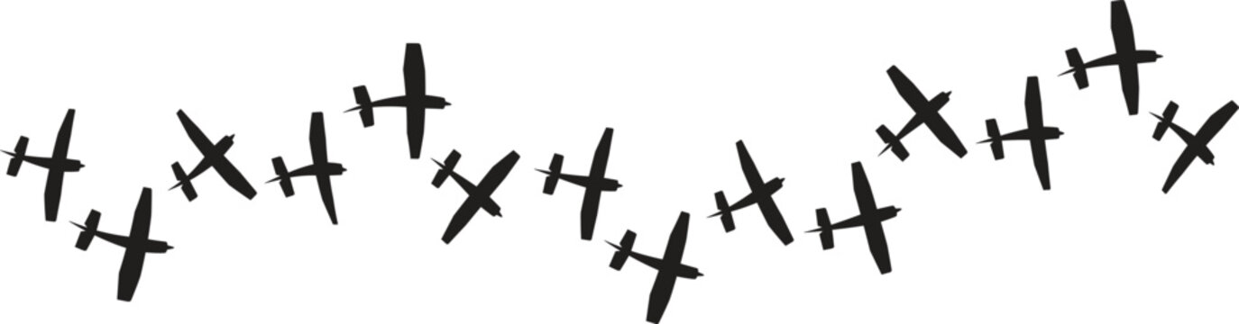 Aeroplane Formation: A squadron of airplanes ascends into the sky, forming a graceful arc, the planes&rsquo; silhouettes against the sky evokes a sense of unity and precision.