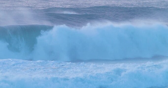 Thunderous ocean waves crashing powerful surf storm slow motion