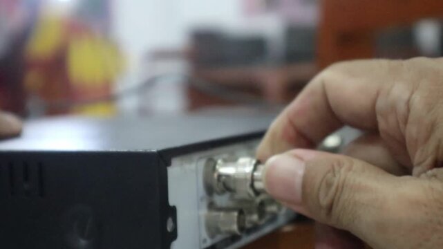 Connecting a BNC connector to a DVR port for a wired CCTV network