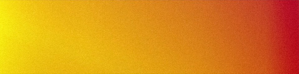 Fototapeta premium Vibrant yellow merging into rich red with a fine grain texture forms an energetic, modern strip ideal for web headers, banners, and bold graphic design layouts.