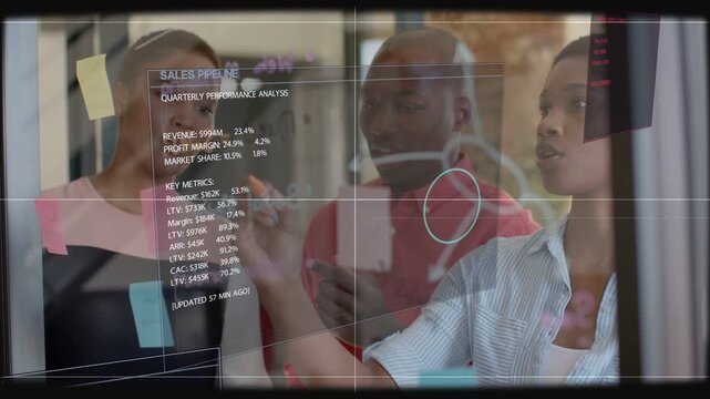 Analytics overlay appearing, three colleagues reading, circling graph and marking for planning