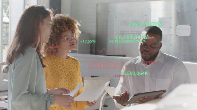 Team tapping and pointing tablet, creating hologram finance overlay updating chart for review