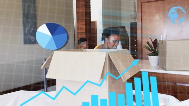 Woman reaching for cup and sorting boxes for moving in, tech charts collecting data over kitchen