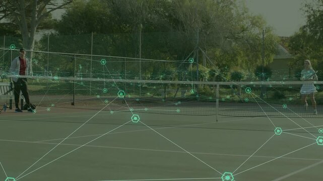 Man initiating tennis rally swinging racket, woman returning shots overlay tracing motion for coach