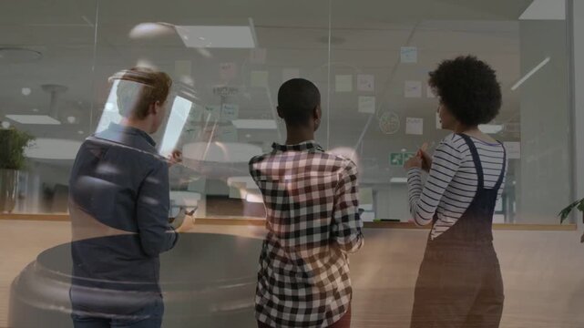 Team planning glass biz left phone pointing, leading others editing notes faint hand-overlay moving