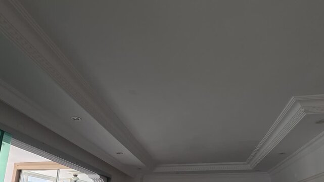 painting work inside a residential building.white paint, High quality 4k footage