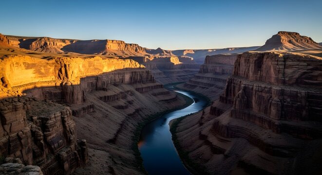 Grand Canyon river bend at sunrise with majestic canyon walls