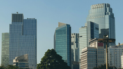 Fototapeta premium Long shot of skyscrapers in Jakarta downtown, the capital city of Indonesia.