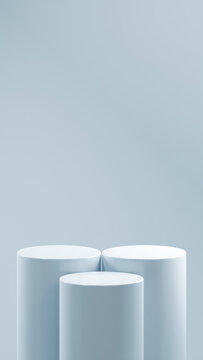3 podiums in pale glaucous color placed in front of a pale glaucous background. 2 podiums are higher than the 1 podium in front of them. product replacement