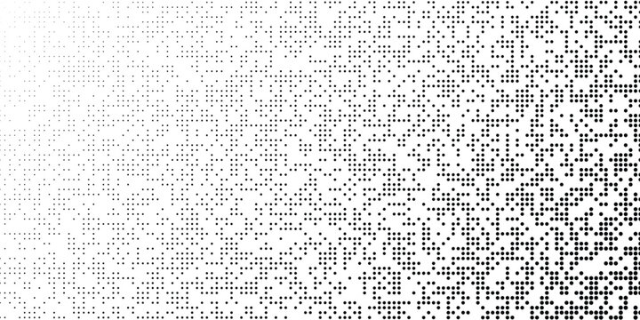 Abstract pattern of black dots fading into white background.