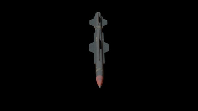 Missile isolated on black background. Cruise missile black background. Old combat rocket is in a dark night sky. Missile with dust grunge textures. Concept: missile attack. Rocket rotate.