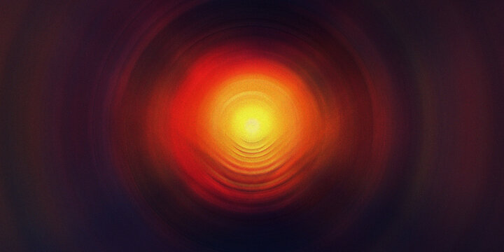 Abstract image of a luminous golden sphere surrounded by radiating red and dark brown concentric circles creating a tunnel effect.