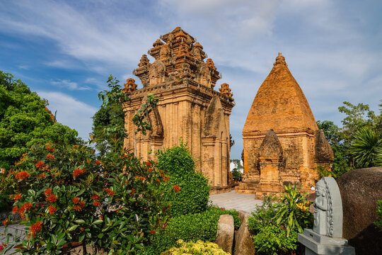 Tourists explore the ancient Cham towers of Po Nagar, a historical religious site dedicated to the goddess Yan Po Nagar. Po Nagar Temple, NHA TRANG, VIETNAM.