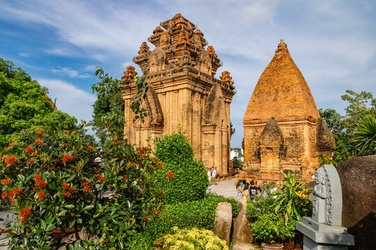 Tourists explore the ancient Cham towers of Po Nagar, a historical religious site dedicated to the goddess Yan Po Nagar. Po Nagar Temple, NHA TRANG, VIETNAM.